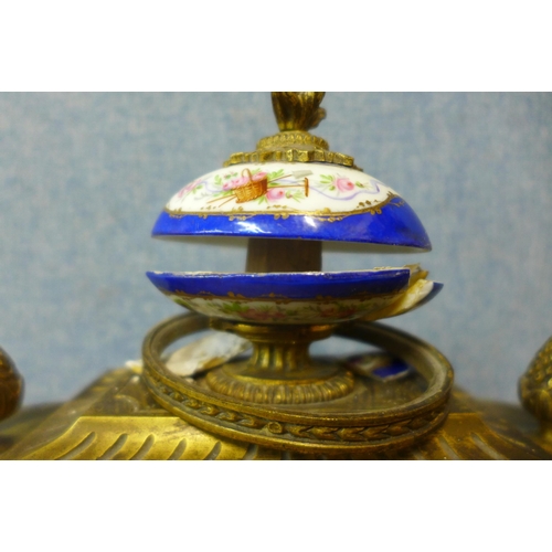 402 - A 19th century gilt metal and porcelain mantle clock, a/f