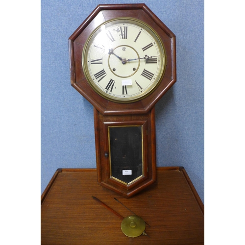 409 - An American mahogany 8-day Waterbury wall clock