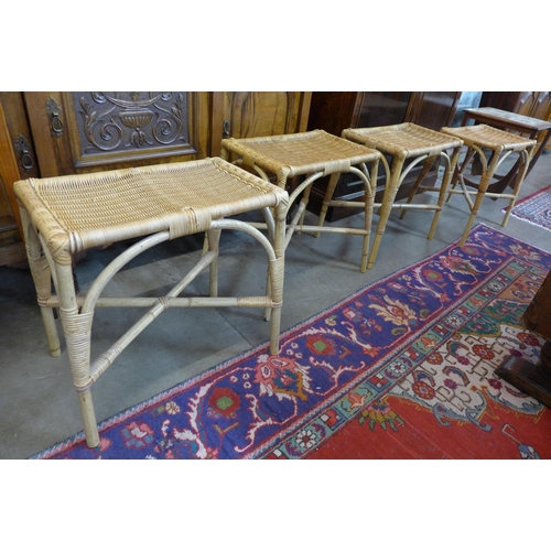 42 - A set of four bamboo and wicker stools