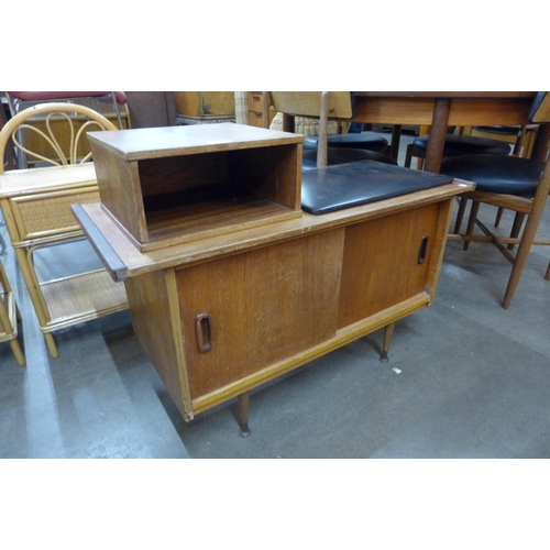 44 - A teak telephone seat