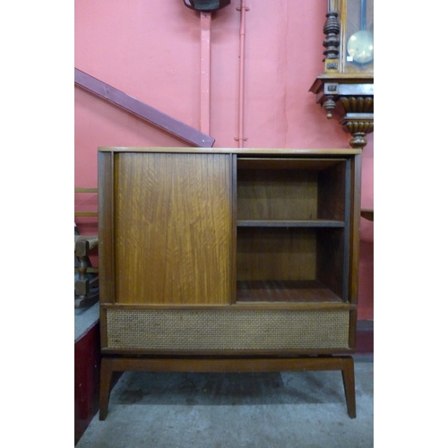 5 - A Danish teak tambour front cabinet