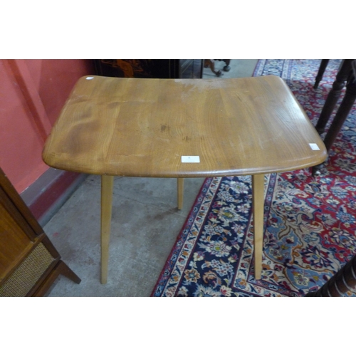 8 - An Ercol Blonde elm and beech side table