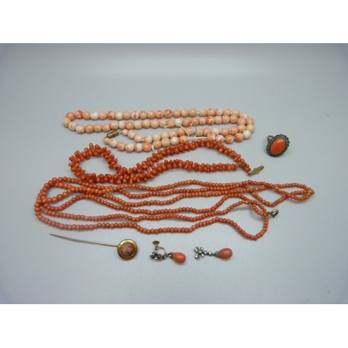 953A - Three coral necklaces, a coral stick pin, ring and pair of earrings