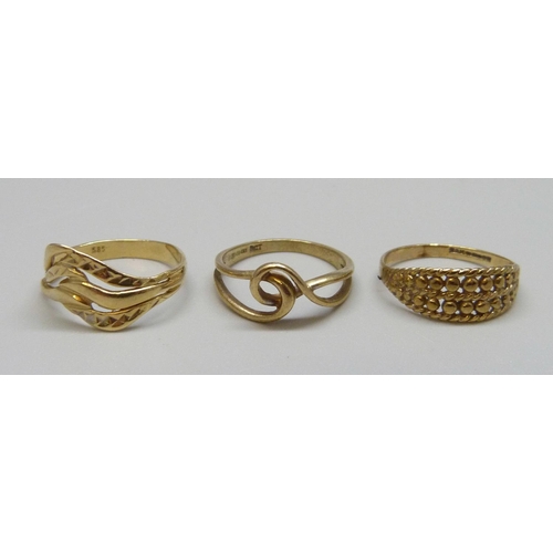 1004 - Two 9ct gold rings, 3.1g, L & M and a 14ct gold ring, 1.9g, N