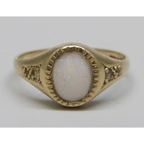 1038 - A 9ct white gold, opal solitaire ring, 1.8g, M