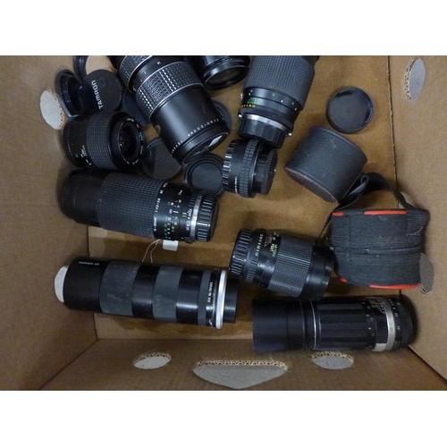 1192 - A box of mixed camera lenses **PLEASE NOTE THIS LOT IS NOT ELIGIBLE FOR POSTING AND PACKING**