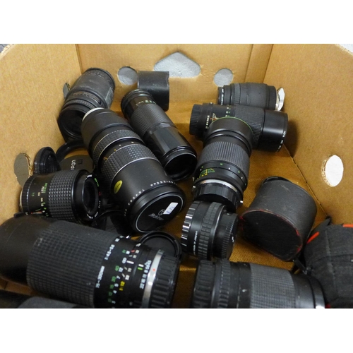 1192 - A box of mixed camera lenses **PLEASE NOTE THIS LOT IS NOT ELIGIBLE FOR POSTING AND PACKING**