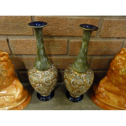 1217 - A pair of Doulton stoneware vases, both a/f and a pair of Staffordshire lions **PLEASE NOTE THIS LOT... 