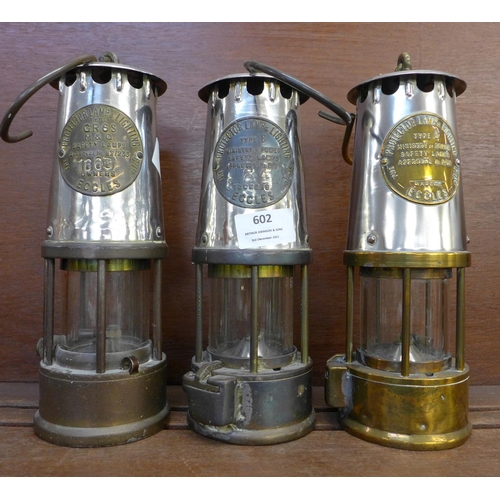 602 - Three miner's lamps