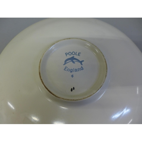 605 - A Poole Delphis plate; 27cm diameter