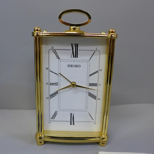 612 - A Seiko mantel clock with receipt