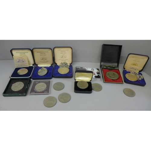 618 - A collection of eight commemorative crowns, Metropolitan Police medallions, etc.