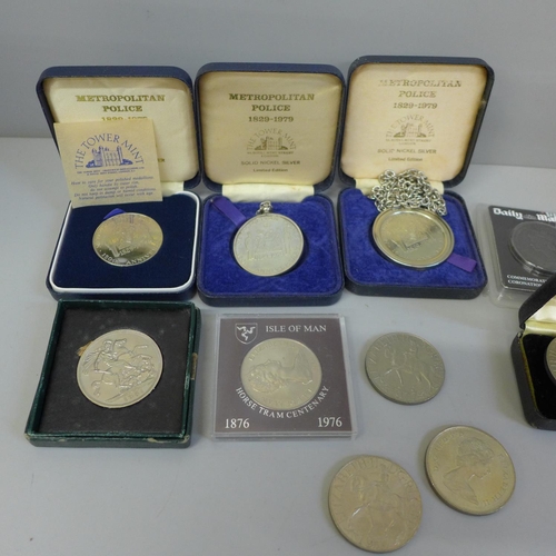 618 - A collection of eight commemorative crowns, Metropolitan Police medallions, etc.