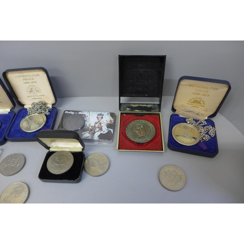 618 - A collection of eight commemorative crowns, Metropolitan Police medallions, etc.