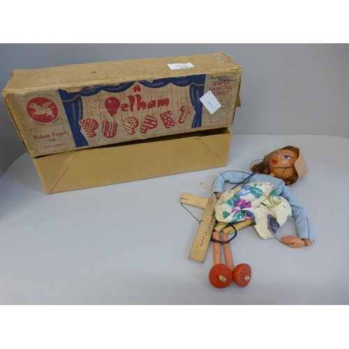 622 - A boxed Pelham puppet of a girl