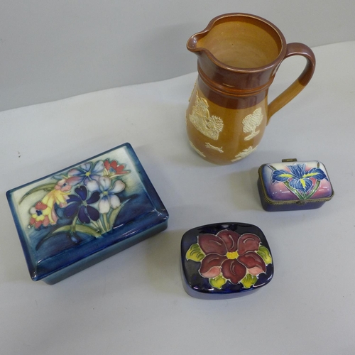 623 - Two Moorcroft pots, the larger one signed W.Moorcroft, an Old Tupton ware pot, and a Royal Doulton s... 