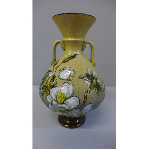 628 - A Linthorpe 1081 vase, 18.2cm tall