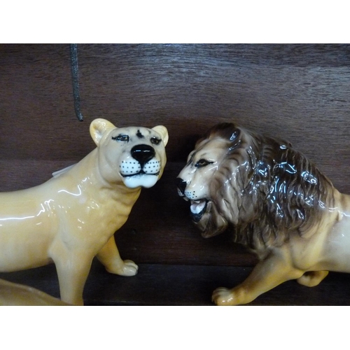 641 - A Beswick lion, lioness and cub ceramic figures