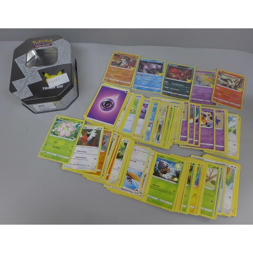 645 - Pokemon cards; a Pokemon collectors tin containing 150 basic Pokemon cards and five holographic card... 