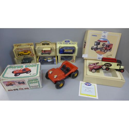 670 - A Corgi Toys Terrys of York van set, Lledo and other model vehicles and a battery operated Super Bug... 