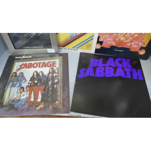 687 - A signed Ozzy Osbourne picture and four Black Sabbath records