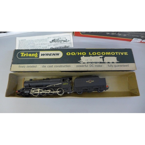 688 - A Tri-ang Wrenn OO gauge 8F 2-8-0 locomotive and tender and a R.157 diesel railcar power and trailin... 