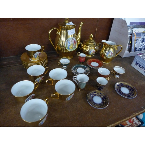 689 - A Czechoslovakian gold lustre tea set and a set of six Past Times cups and saucers