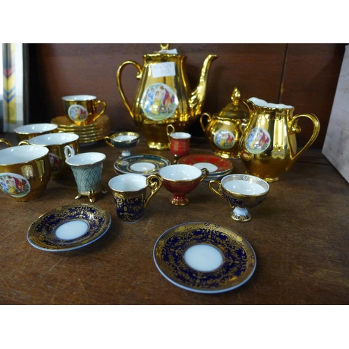 689 - A Czechoslovakian gold lustre tea set and a set of six Past Times cups and saucers