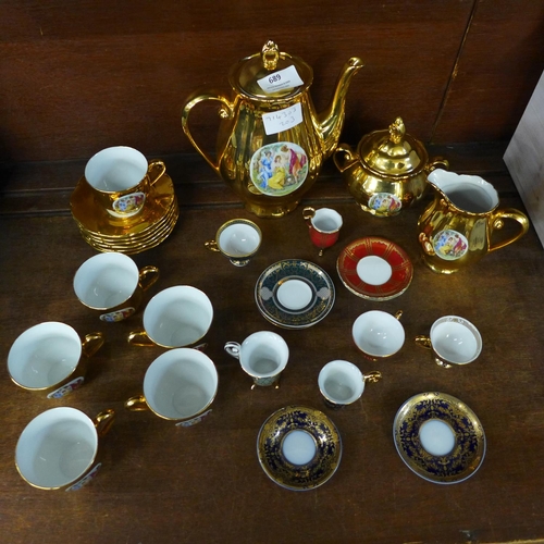 689 - A Czechoslovakian gold lustre tea set and a set of six Past Times cups and saucers