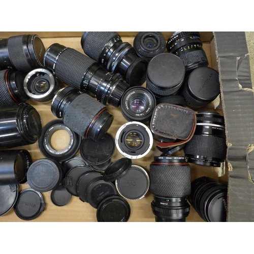 708 - A box of 21 mixed camera lenses