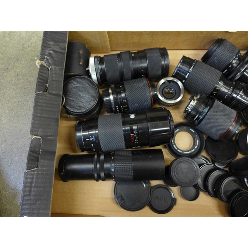 708 - A box of 21 mixed camera lenses