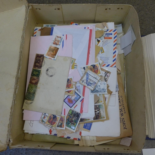 709 - A collection of loose stamps, first day covers and a stamp album