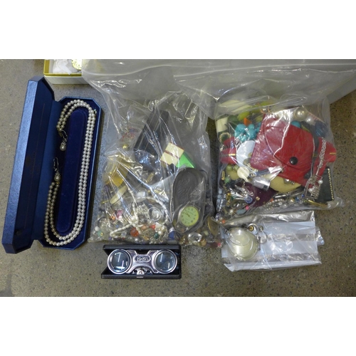 713 - A large box of costume jewellery and watch components