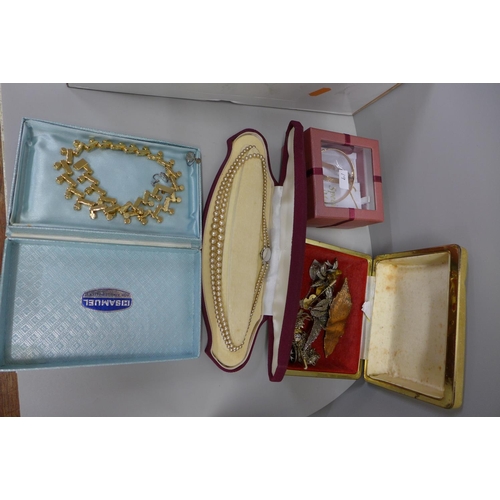 729 - A box of costume jewellery