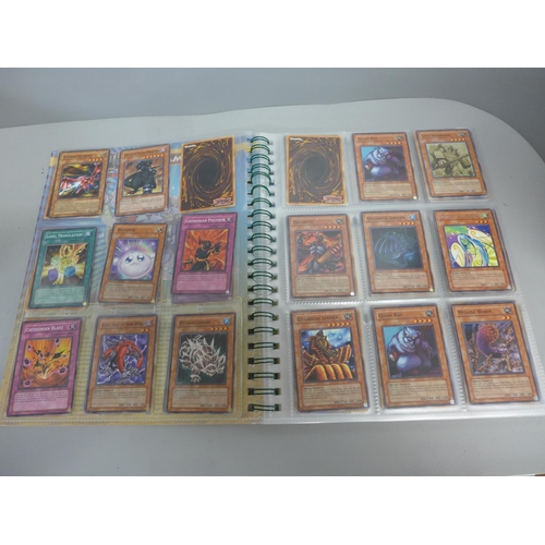 738 - Over 450 1990s Yu-Gi-Oh! cards including holographic and first editions, some in collector's folder ... 