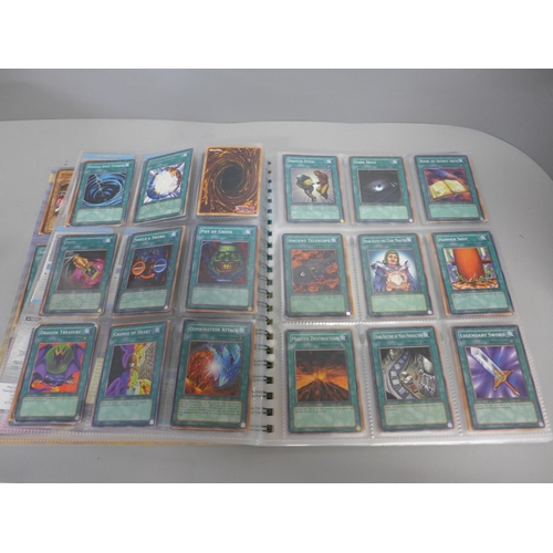 738 - Over 450 1990s Yu-Gi-Oh! cards including holographic and first editions, some in collector's folder ... 