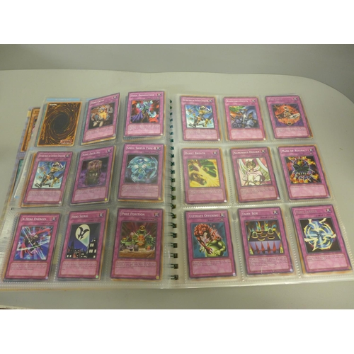 738 - Over 450 1990s Yu-Gi-Oh! cards including holographic and first editions, some in collector's folder ... 