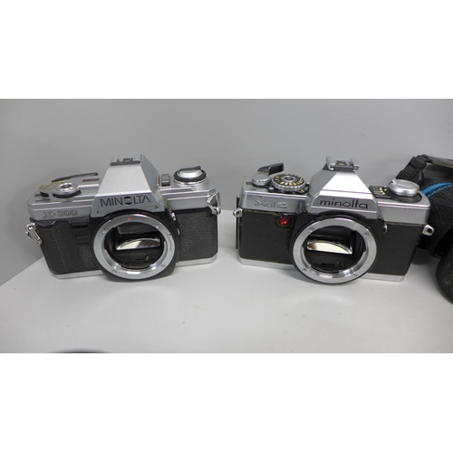 742 - Four 35mm camera bodies, Nikkormat, Nikon F3, Minolta XG2 and X300and four 35mm cameras, Nikon F50 C... 