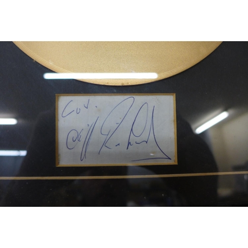 751 - A Cliff Richard autograph and gold record display