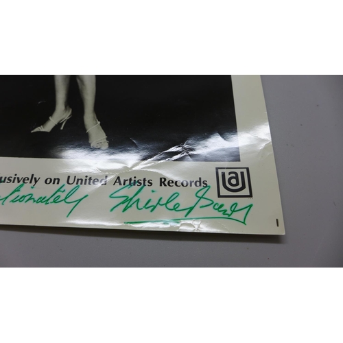 759 - Shirley Bassey: a black and white publicity photo, signed in black felt-tip, with covering note date... 