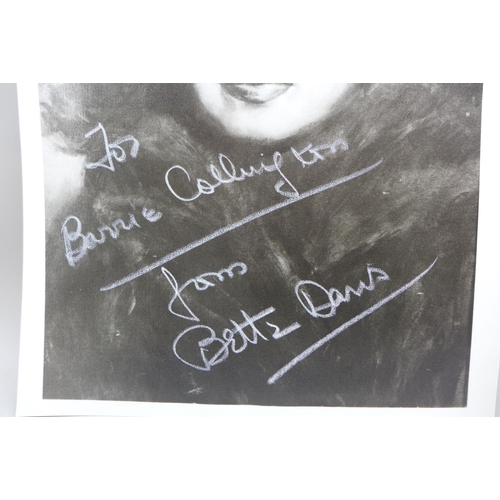 775 - Bette Davis: a black and white publicity portrait, signed in white pen, with original postage envelo... 