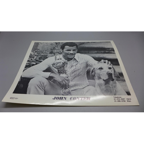 777D - John Conteh: a black and white publicity photo, with original postage envelope dated 1984, signed in... 