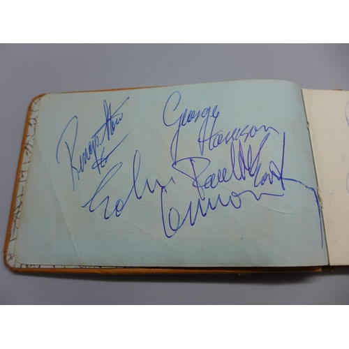 779 - A 1960s autograph book containing signatures including those of The Beatles, Gordon Banks and Mike S... 