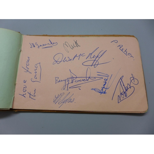 779 - A 1960s autograph book containing signatures including those of The Beatles, Gordon Banks and Mike S... 