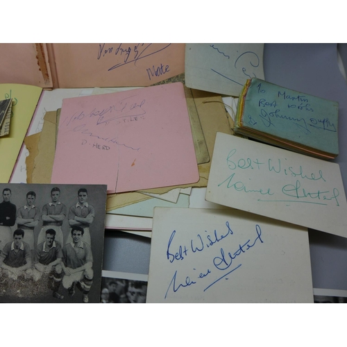 798 - An autograph book and photographs of 1960's Manchester United