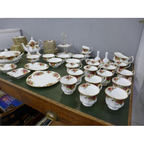 803 - A Royal Albert Old Country Roses dinner service, complete, one plate a/f. Also two rose-pattern bell... 