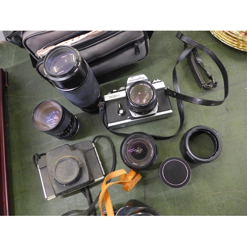 805 - A Minolta XE-1 35mm camera, three additional lenses, one other camera and a pair of Zodiac 10x50 bin... 