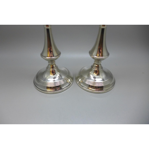 848 - A silver pair of candlesticks, Birmingham 1969, weighted bases, 534g gross