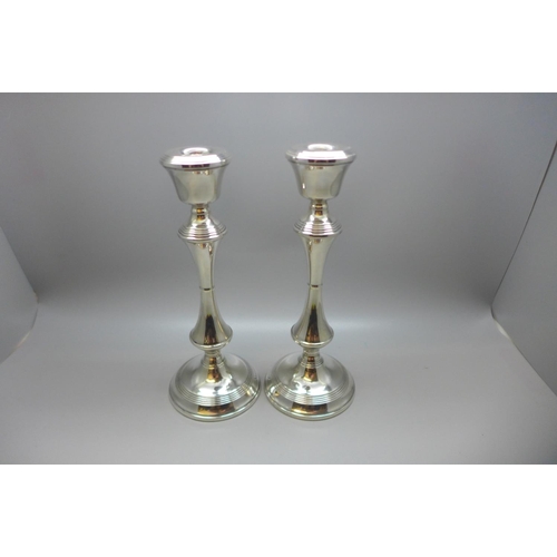 848 - A silver pair of candlesticks, Birmingham 1969, weighted bases, 534g gross