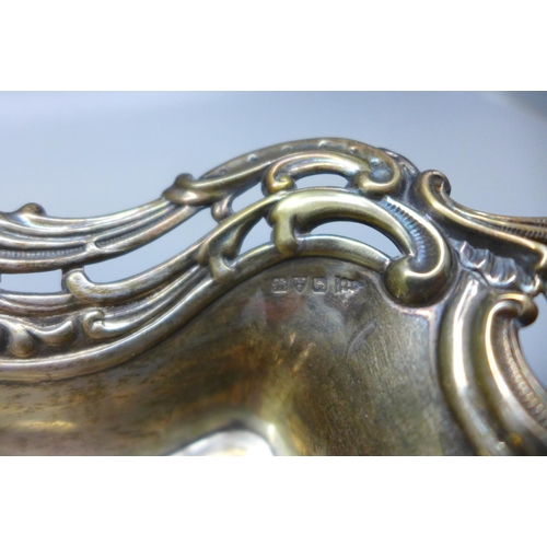 855 - A silver embossed bowl, 112g